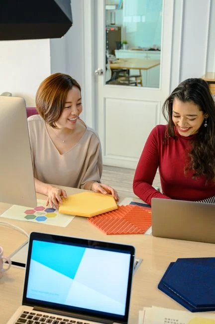 A person using a laptop to browse stock photo websites. Freelancing work in a cozy setting.